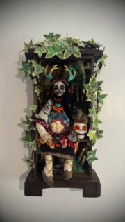 ✨ Vasilisa’s Doll and her clock box home are complete! Just in time, as tomorrow I travel to London to see her shadow, Baba Yaga, on display @zarigallerylondon .

In the tale, Vasilisa the Brave is gifted a magic doll by her mother. With her help, she overcomes Baba Yaga’s impossible tasks, separating grains, cleaning the house on chicken legs, and doing Baba Yaga’s laundry. The doll represents inner strength, inherited wisdom, and perseverance, and Vasilisa is rewarded with a flaming skull of fire.

I made my Vasilisa’s Doll thinking of my own female line. She carry’s quartz for intuition, lavender for calm, cleavers for renewal, and vervain for protection. She is a doll to be held, resting only in her clock box when weary. 🌿

#VasilisaTheBrave #BabaYaga #MythicArt #FolkTales #FemininePower #LightVsDark  #ContemporaryCraft #StoryInClay #zarigallery #flotsam_fables