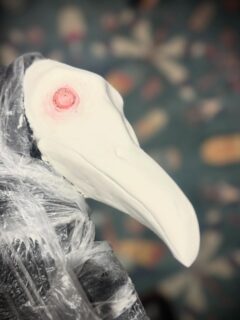 I’ve been working on this crow’s head today. Eventually it will be painted, but for now I’m strangely fond of the unintentional pink eyes, the red dyed seeds I used have tinted the clay a soft pink. A small alchemy I didn’t expect 🖤✨

I have been feeling a little sad recently, and quietly making this chap feels like a healing thing to do. Blessings to you lovely folk.. 🐦‍⬛🕯️

#wip #crows #mythicart #creaturemaker #clayart #flotsam_fables